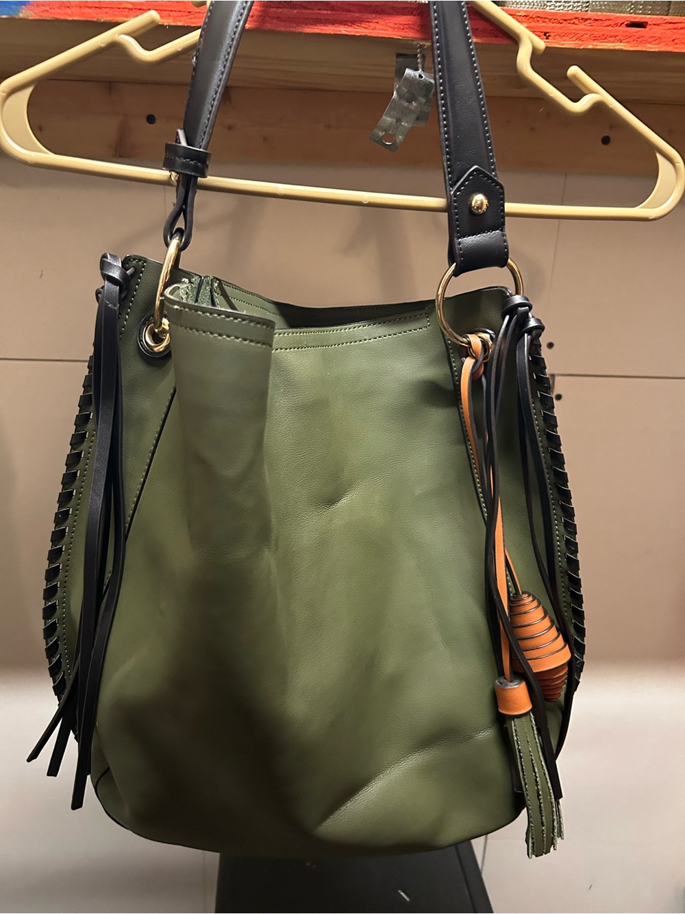 Anthropologie Olive Green Shoulder Bag with Black Straps and Orange Tassel